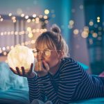 pruning woman holding globe