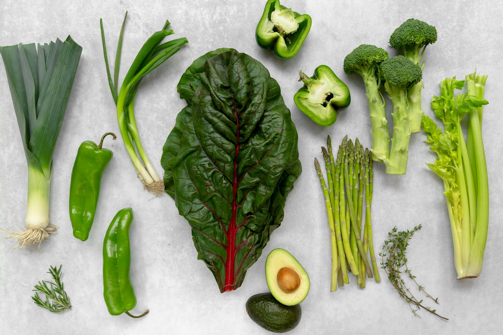 a variety of vegetables are laid out on a table